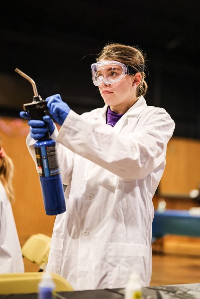 lab student doing experiment