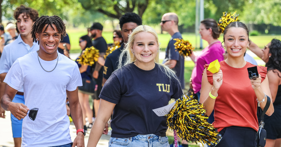 three students at orientation