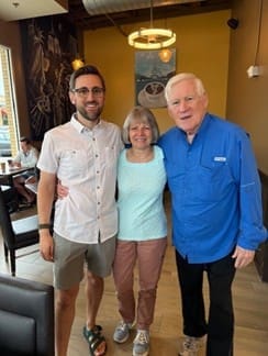 Marcus Stone, TLU's Charla Bailey, and Marcus's father, Mike Stone