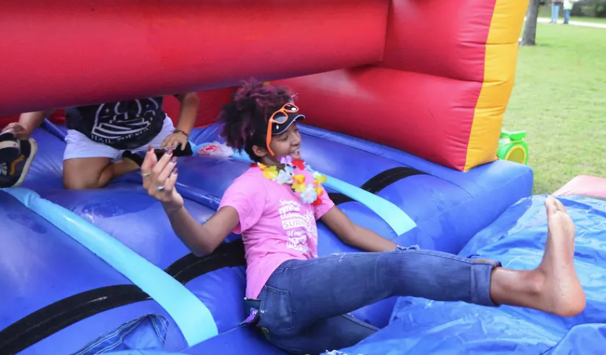 student on bouncy house