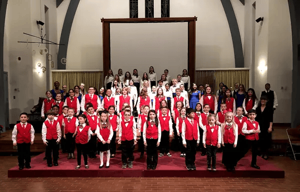 A choir of young people in concert.