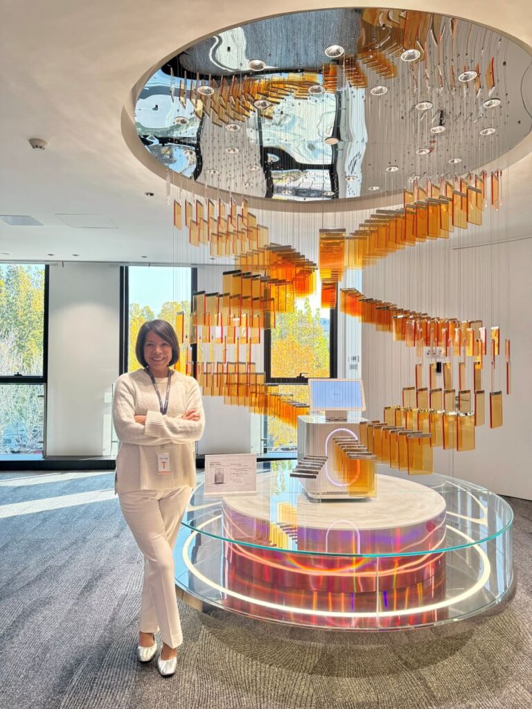 TLU alum Julie Hiner with glass artwork